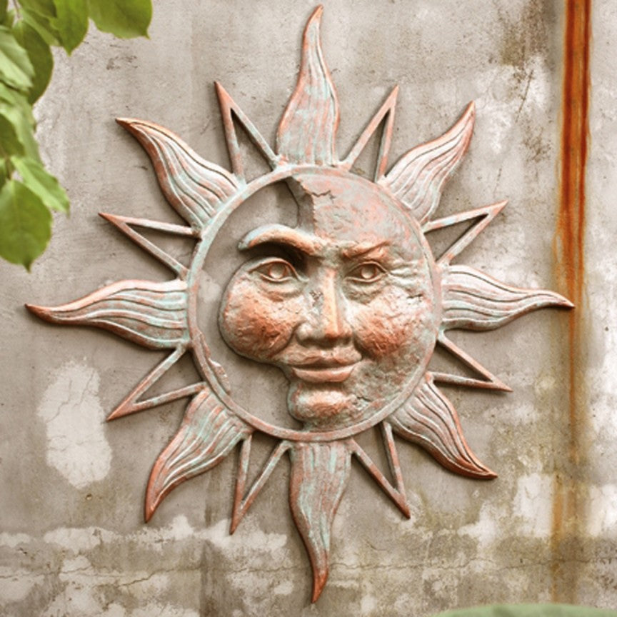 Sculptural metal wall decor for patios, porches and garden walls
